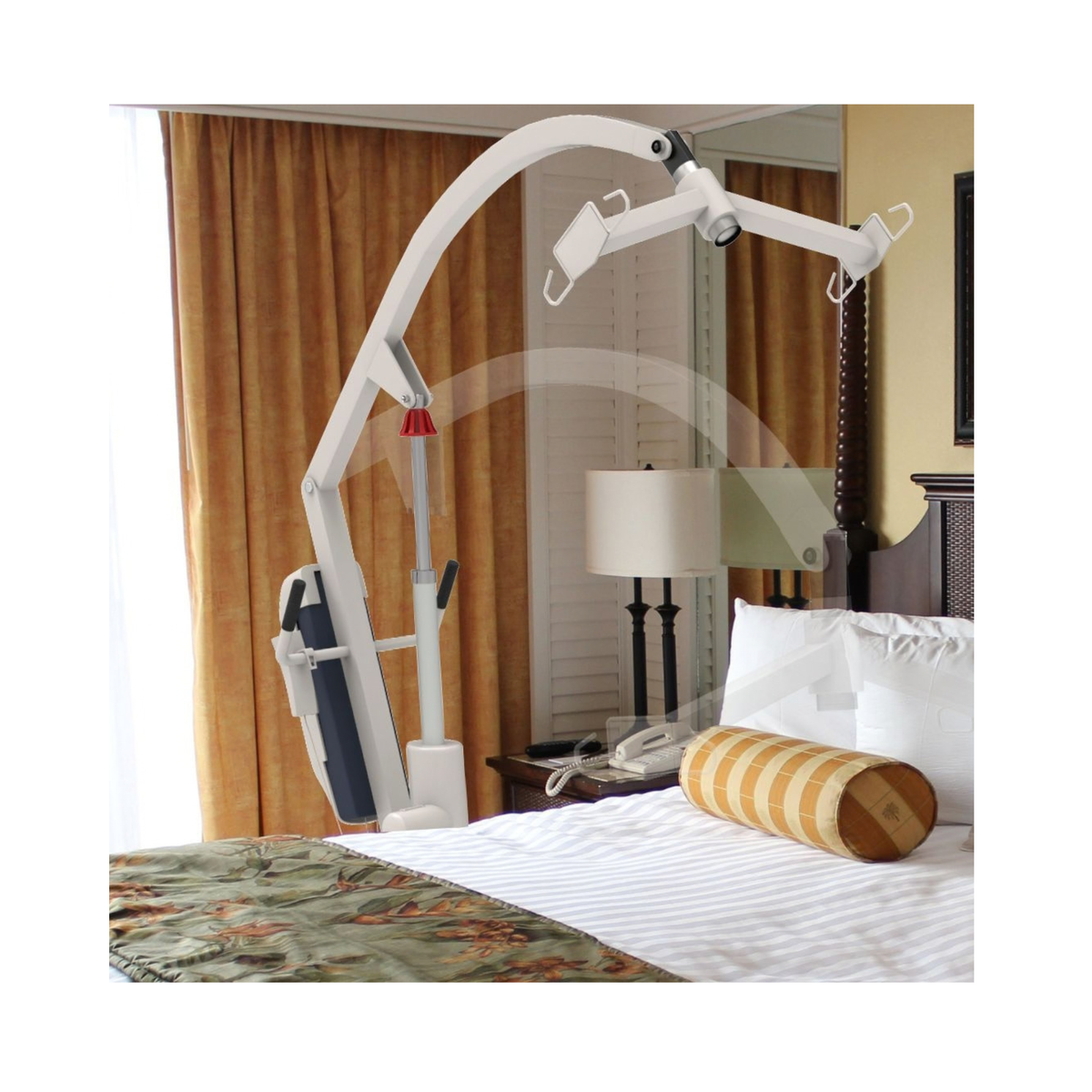 Grúa junto a una cama de dormitorio, con el brazo extendido sobre el colchón